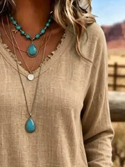 100% polyester Care instructions: Machine wash cold blouse in Khaki with relaxed silhouette