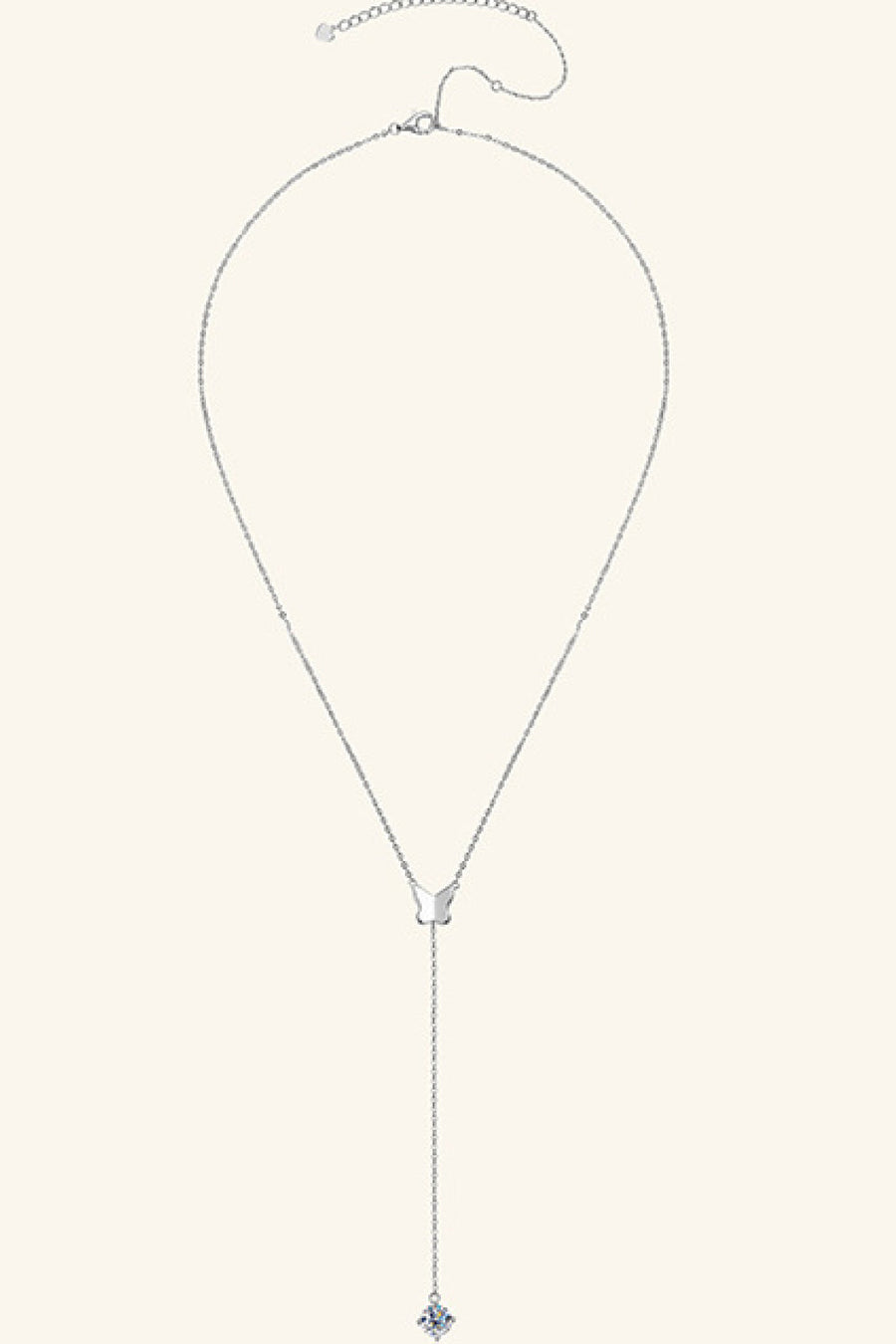 Silver lariat necklace with butterfly pendant and moissanite drop