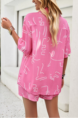 Pink abstract print resort shirt with button-down collar and short sleeves, paired with matching shorts.