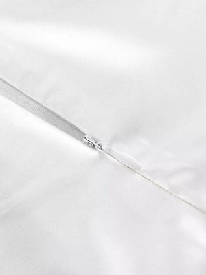 White satin dress with a silver zipper detail