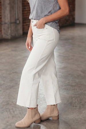 98% cotton, 2% elastane Care instructions: Machine wash cold jeans in White with loose silhouette