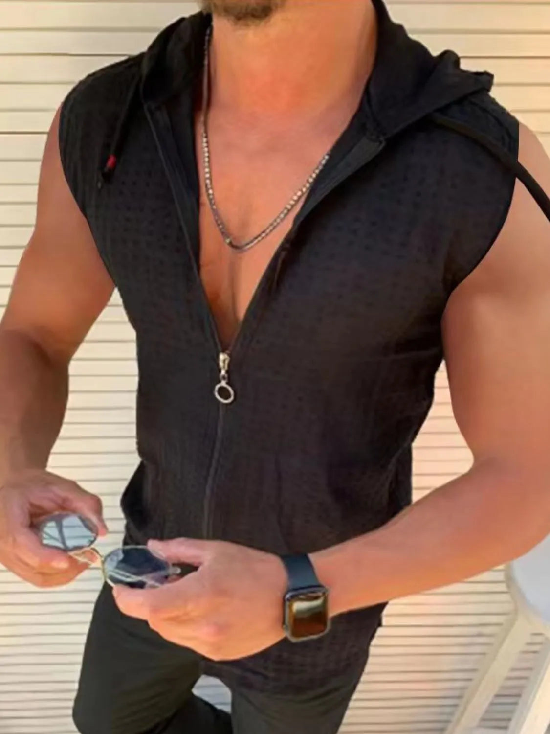 Black textured sleeveless zip-up hooded vest with ring pull zipper and casual fit