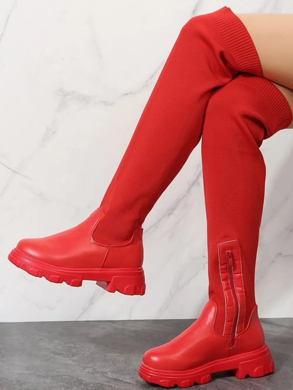 Red knit-top platform over-the-knee boots with side zipper detail