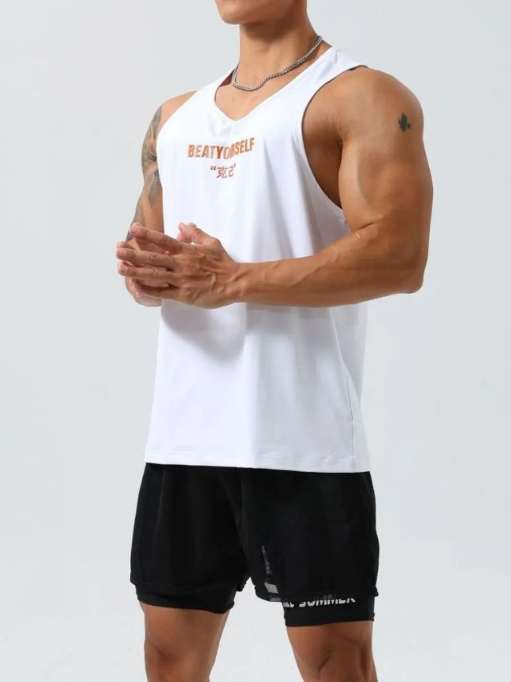 White athletic tank top with graphic inscription and v-neck