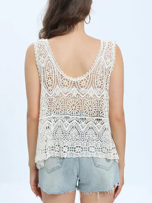 White crochet overlay tank top with intricate lace pattern and scalloped hem.