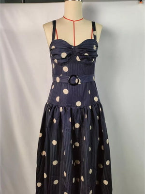 Black polka dot midi dress with sweetheart neckline and belted waist