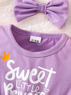 Purple baby dress with "Sweet Little Princess" graphic and matching bow headband.