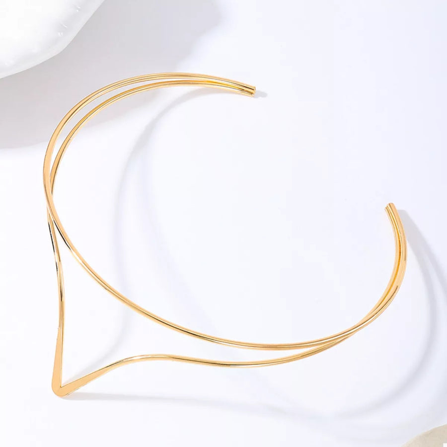 Golden V-shaped double layer choker necklace with open ends.