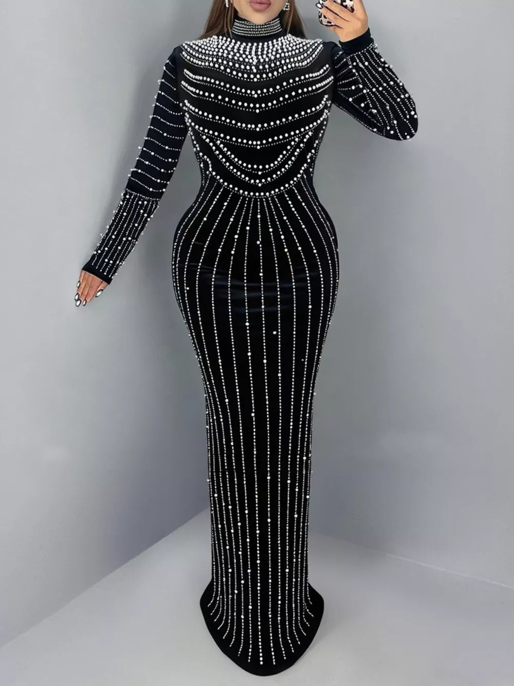 black maxi dress with geometric and mock neck