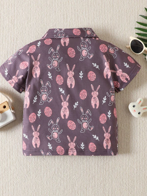 Baby short-sleeve shirt with allover bunny and Easter egg print.