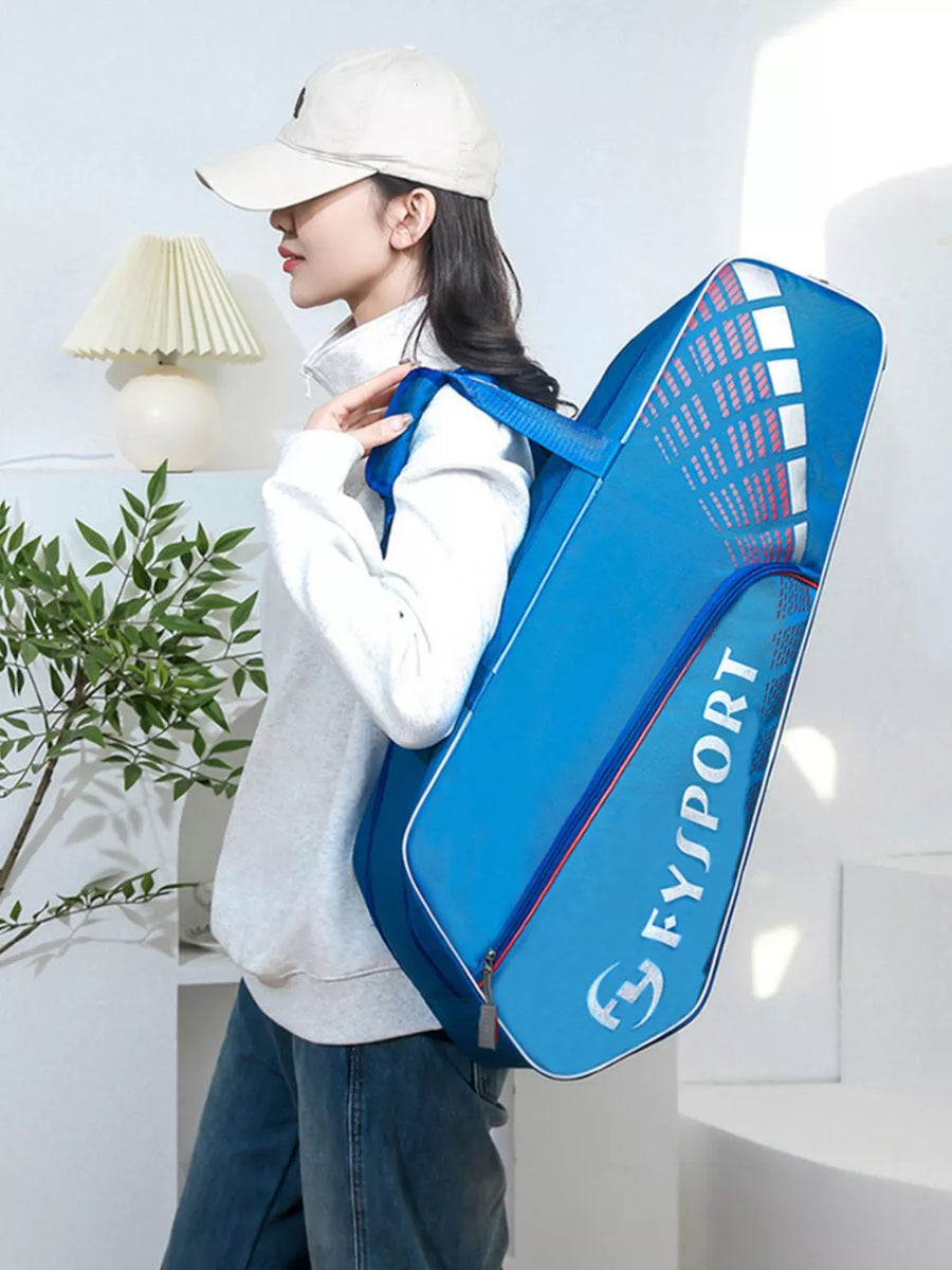 Blue nylon sports equipment bag with white text and graphic details