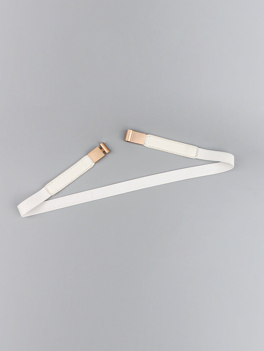 White elasticated buckle belt with leather detail and rose gold hardware