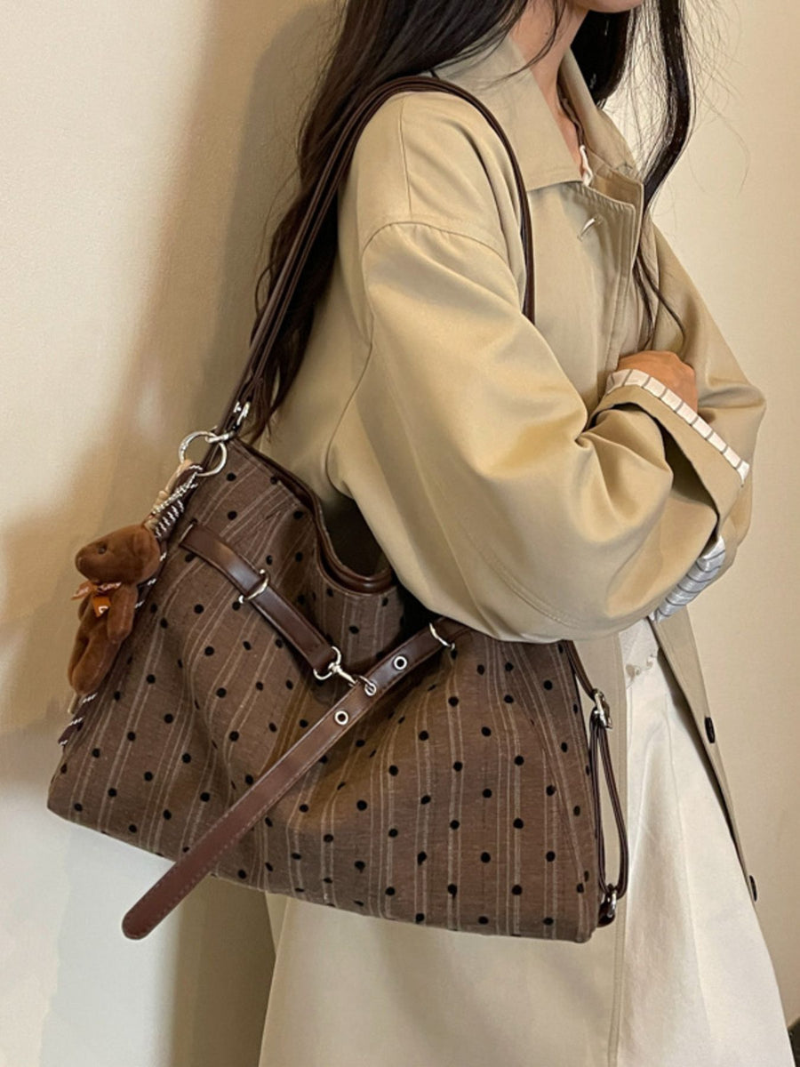 handbag featuring polka dot, striped in brown with Polyester Imported Size &am texture