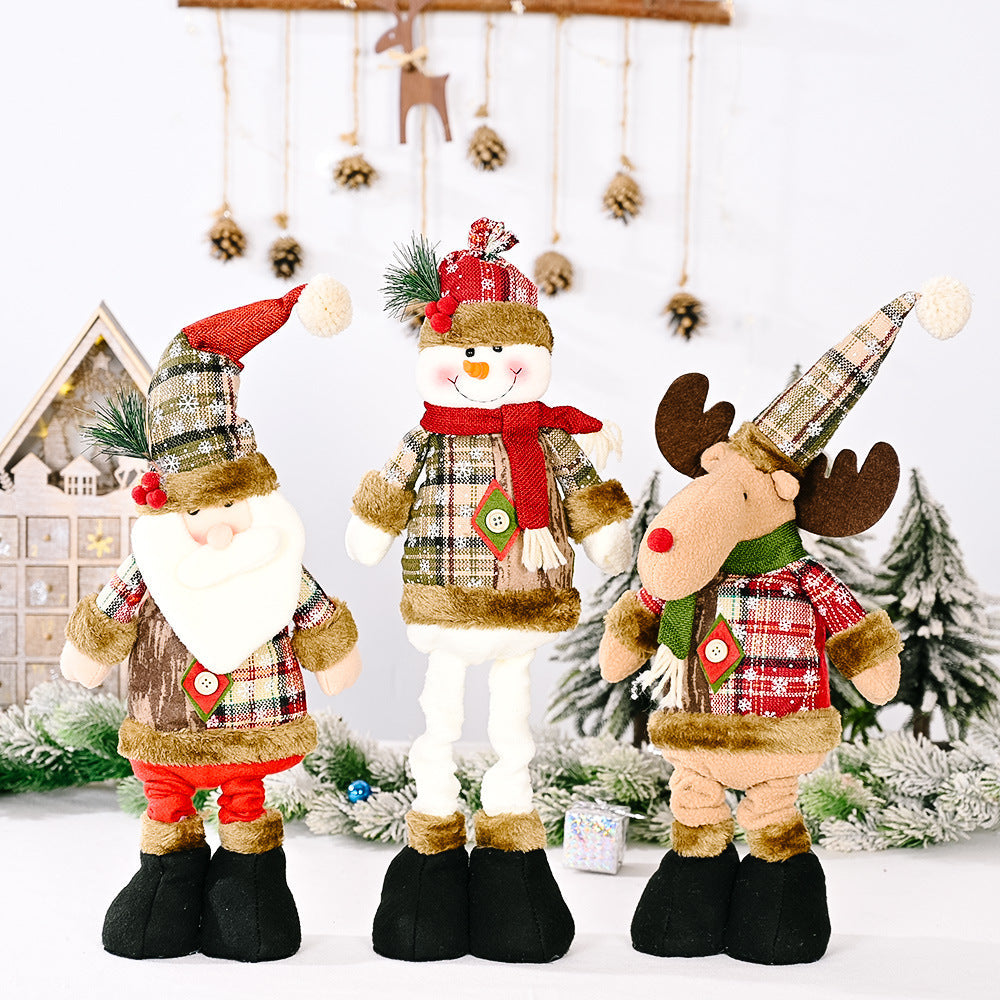 Festive Plaid Character Trio: Santa, Snowman, and Reindeer plush figures with red, green, and brown plaid patterns.