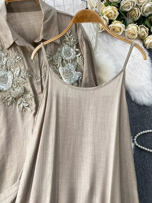 Apricot embroidered floral two-piece set with collared shirt and cami.