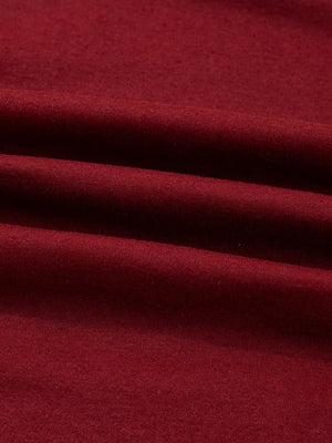 Burgundy long sleeve top with a soft, comfortable fabric texture.