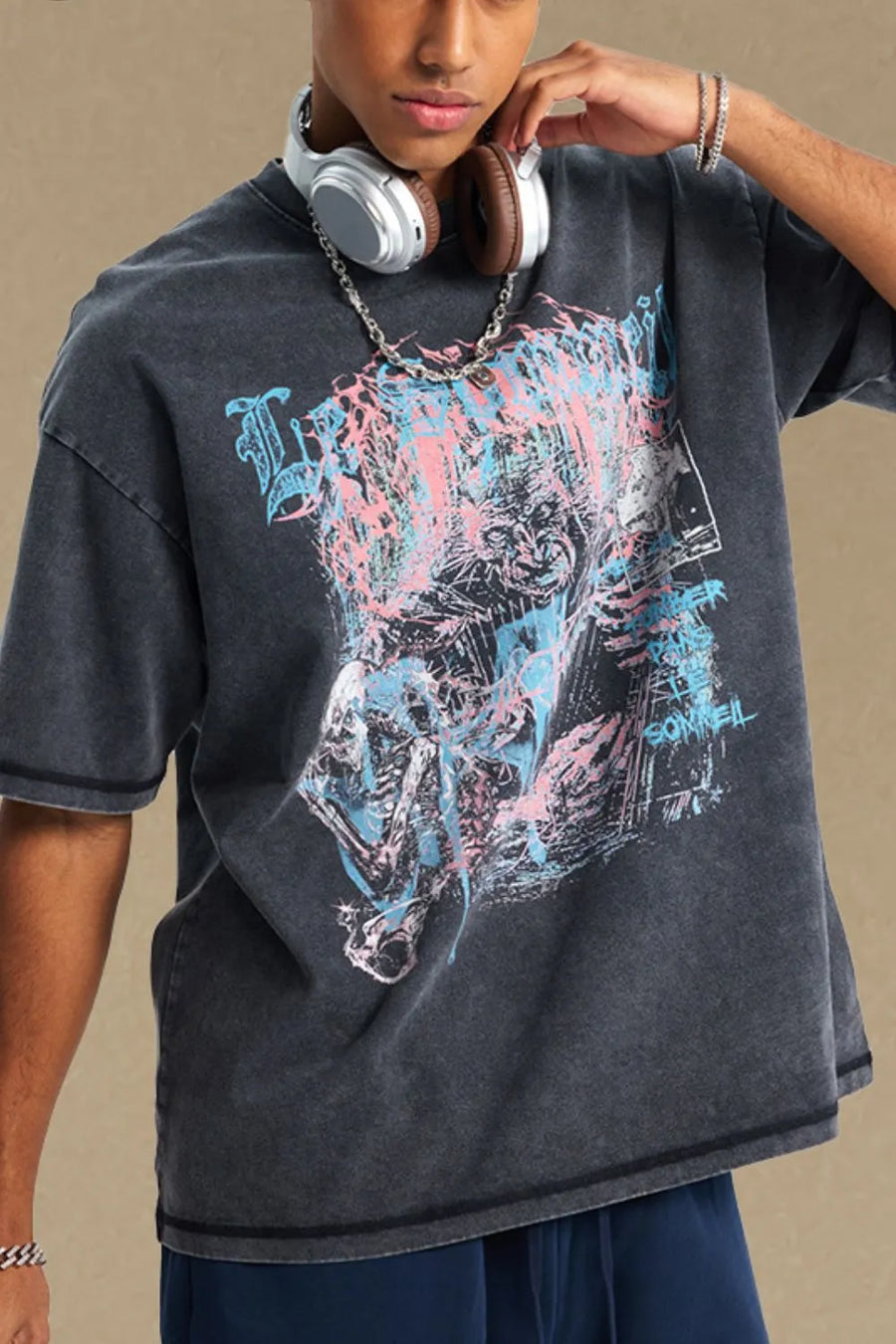 Acid wash black oversized tee with graphic print and crew neck.