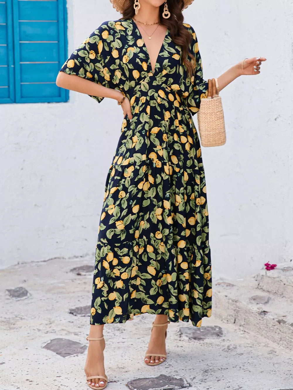 Lemon Leaf Print V-neck Midi Dress in Black Forest cotton blend with tiered skirt and flutter sleeves.