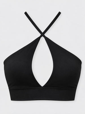At least 95% polyester with spandex halter top in Pea Green with fitted silhouette