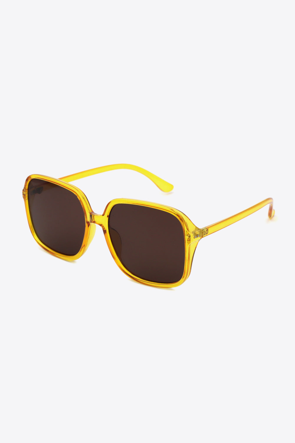 Yellow square frame sunglasses with dark lenses and bold retro style