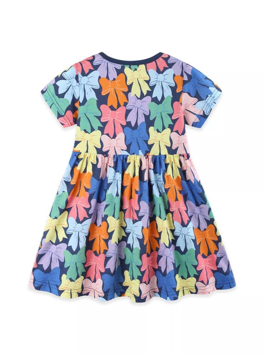Toddler bow print a-line dress with short sleeves and gathered waist in multicolor bows on navy.