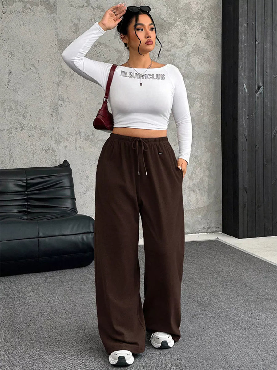 Brown drawstring wide-leg maternity pants with pockets.