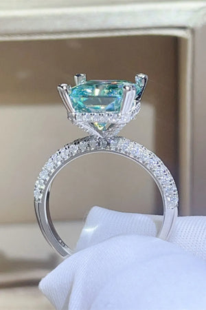 Teal emerald cut pave ring with diamond band
