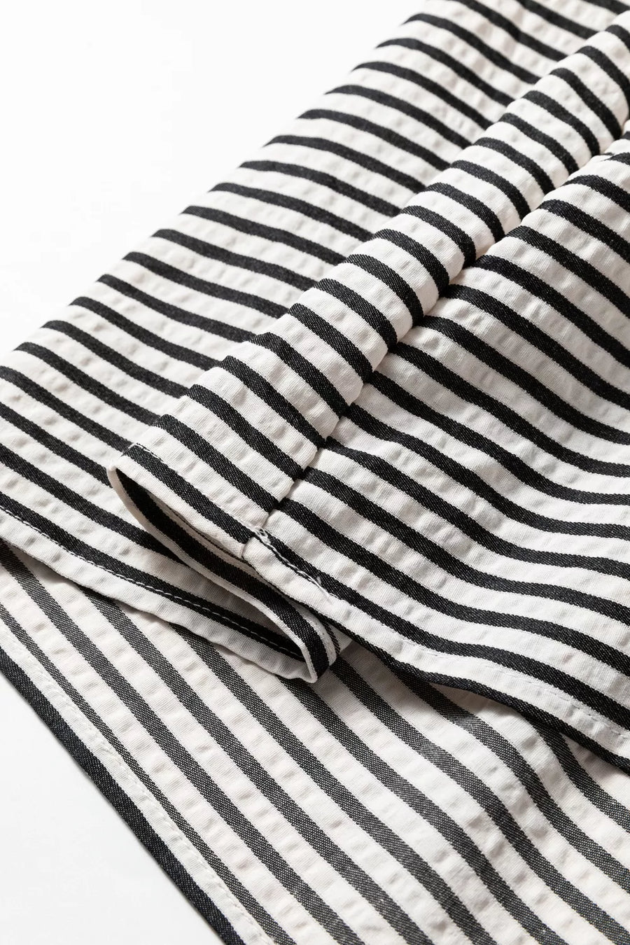 Chic black and white striped cotton midi dress with pockets detail.