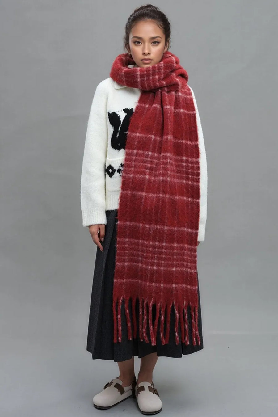 Deep Red plaid fringed winter scarf with a textured weave.