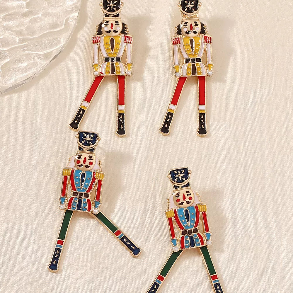 gold earrings with figural and not applicable