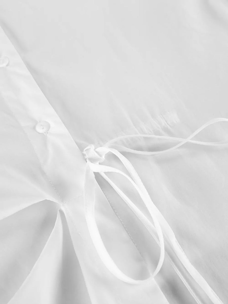 wrap top in white with collared and long sleeve