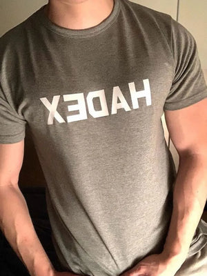 Gray crewneck t-shirt with reversed white graphic text on chest