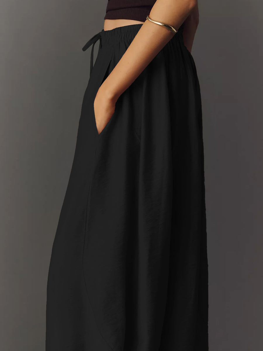 100% polyester Care instructions: Machine wash cold wide-leg pants in Brown with loose silhouette