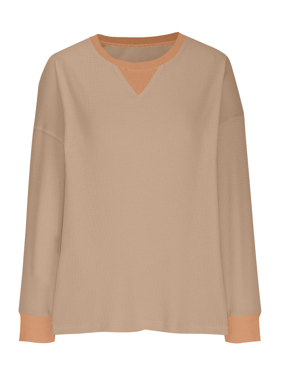 Tan waffle knit raglan sleeve sweatshirt with contrast neckline and cuffs