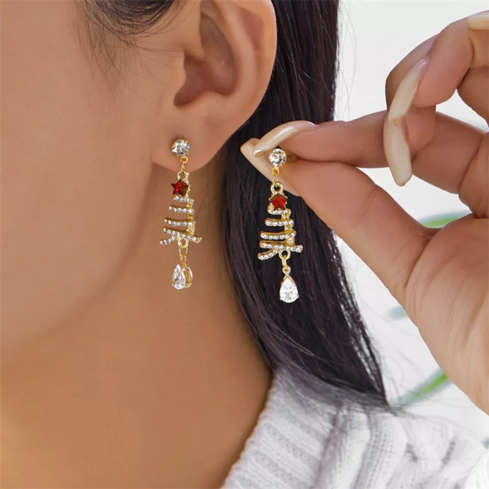 earrings in gold featuring dangle style and dangle fit