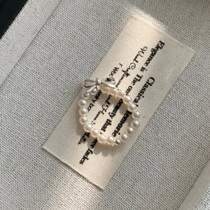 ring in ivory featuring pearl beaded and fitted fit