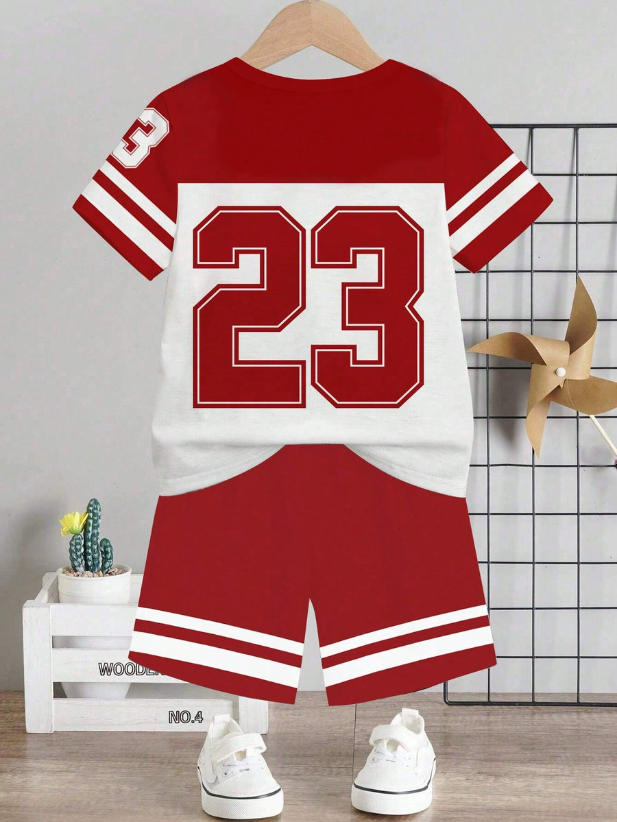 Children's red and white athletic graphic tee with number 23 and matching shorts with stripes.