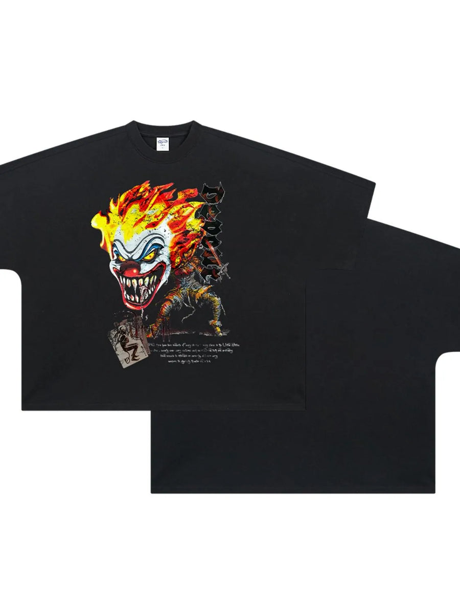 Black oversized t-shirt with a bold clown graphic featuring flames and text.
