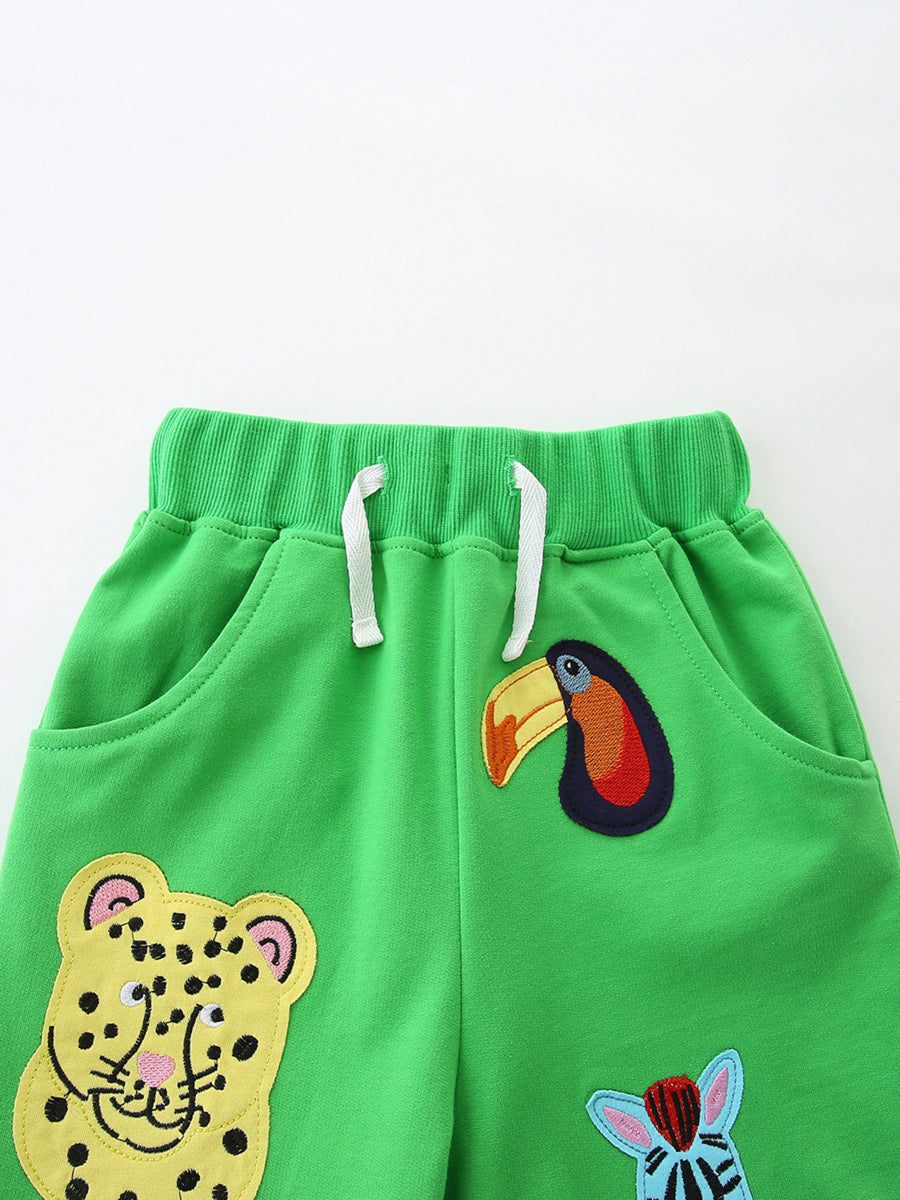 Green cotton shorts with embroidered jungle animals for boys