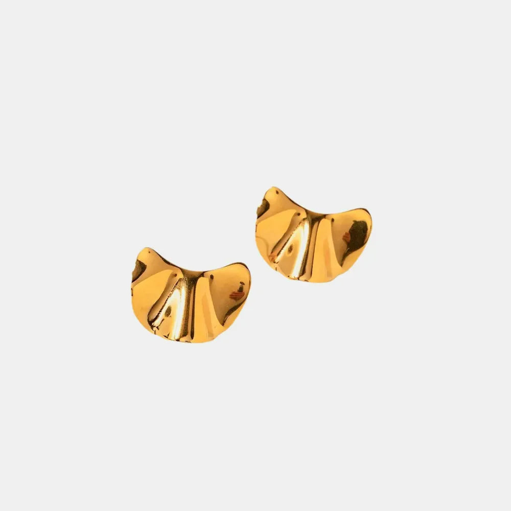 Sculpted gold petal stud earrings with a textured, wavy surface.