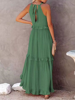 Green ruffled maxi dress with halter neck and tie back detail