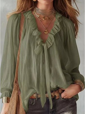 Khaki frilled tie-front shirt with ruffled neckline and long sleeves.