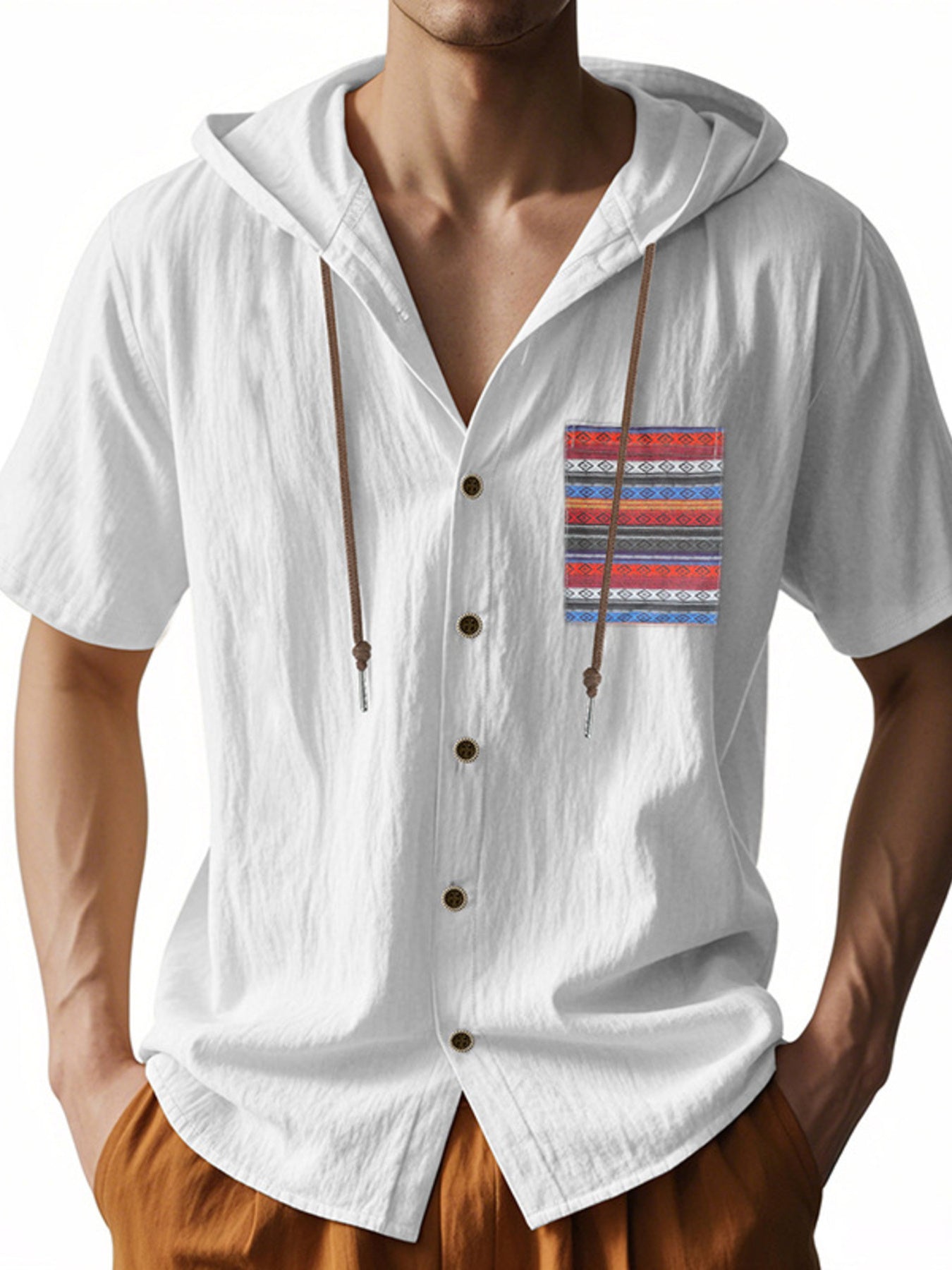 White hooded short sleeve shirt with patterned pocket detail and drawstring hood.
