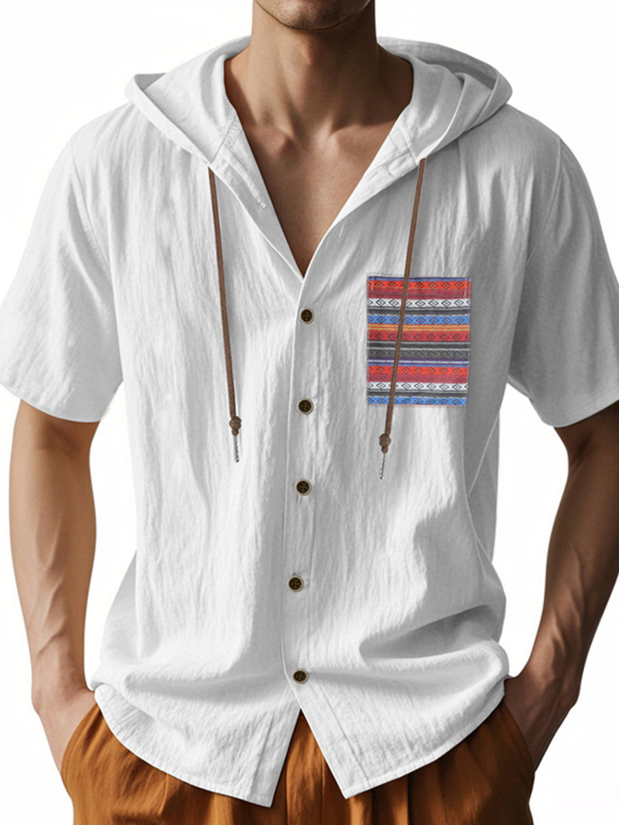White hooded short sleeve shirt with patterned pocket detail and drawstring hood.
