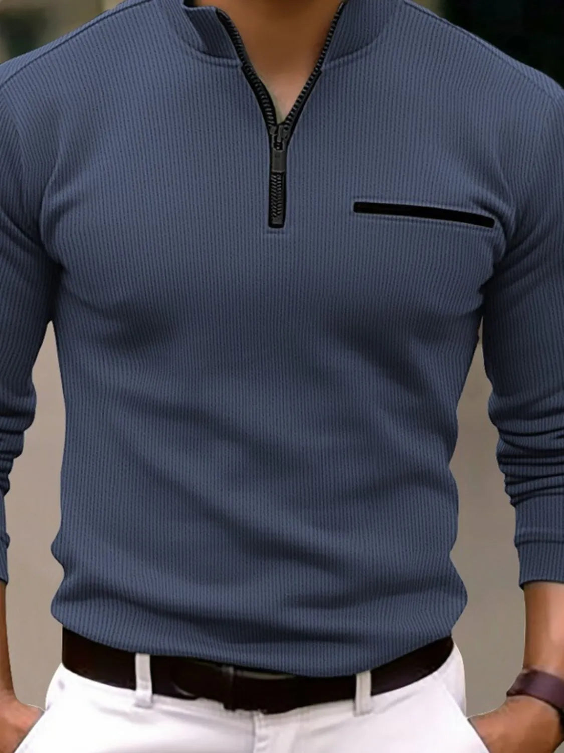 Dusty blue ribbed quarter-zip sweatshirt with black trim pocket and zipper