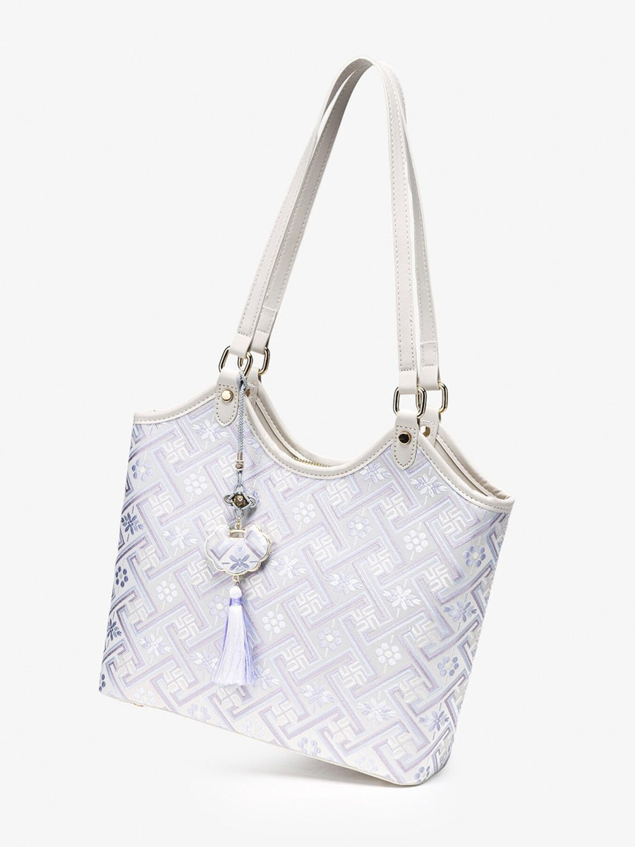 Geometric Pattern Shoulder Bag in off-white with shoulder straps
