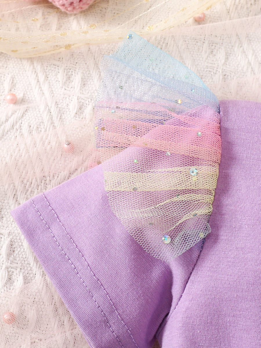 Baby dress with rainbow glitter tulle sleeves and purple cotton bodice.