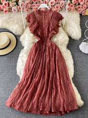 Elegant ruffled lace maxi dress in red with cutout details and a high neckline.