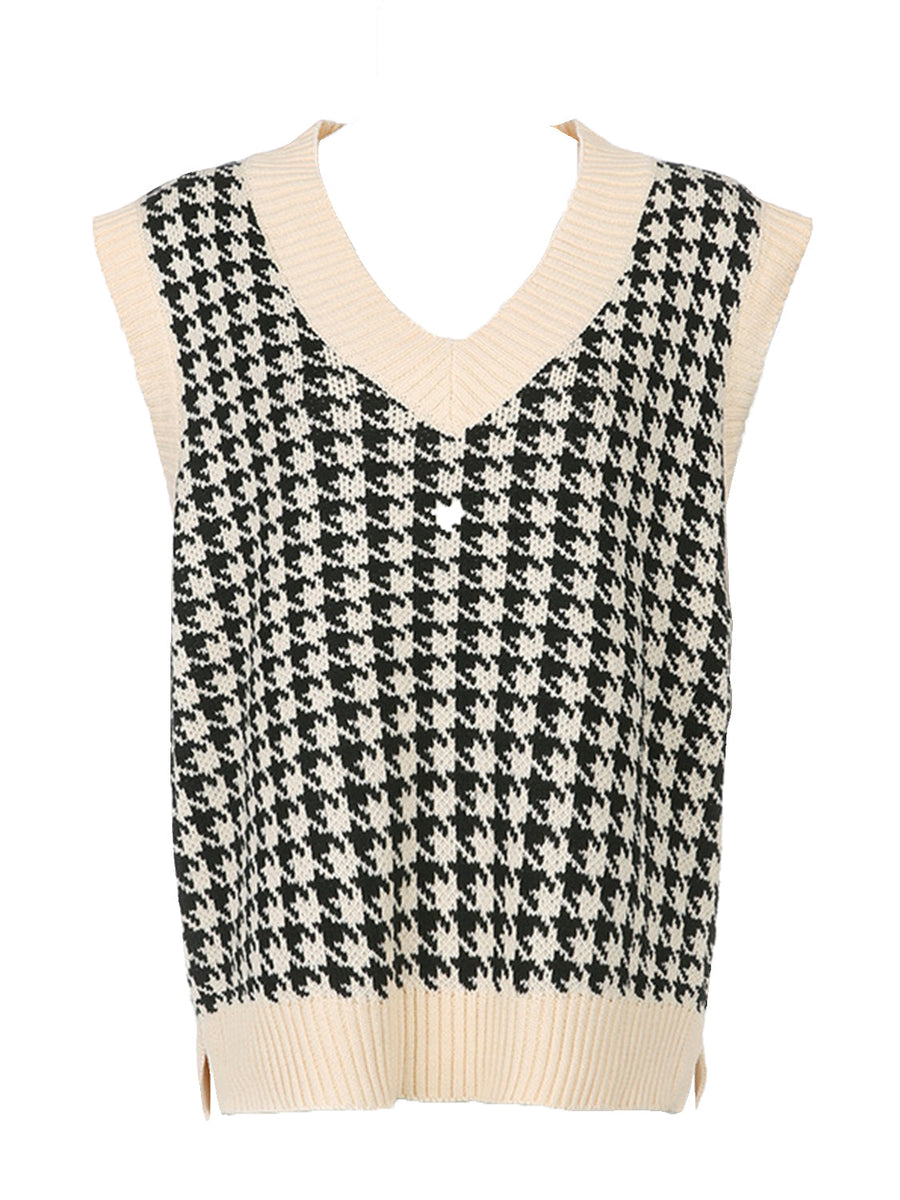 Houndstooth knit v-neck tank top in black and beige with ribbed trim.