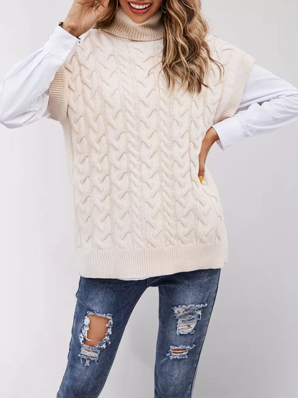 Apricot sweater vest featuring cable-knit and cable knit